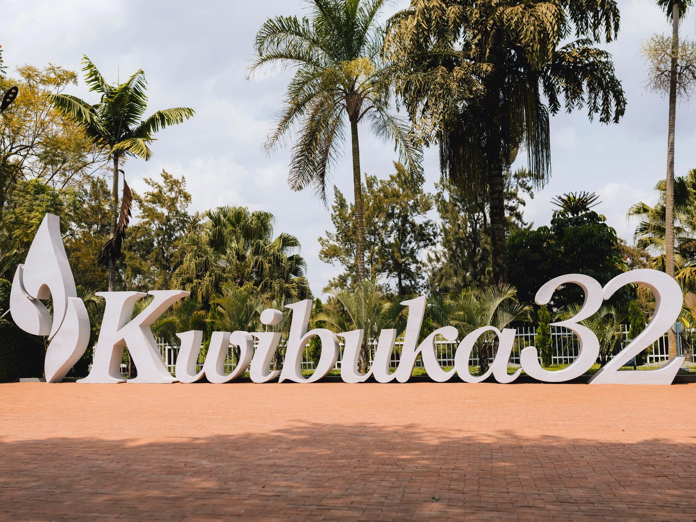 The Kwibuka 32 sign in the gardens of the Kigali Genocide Memorial